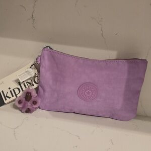 Kipling Lavender Zip Wristlet with Monkey Charm